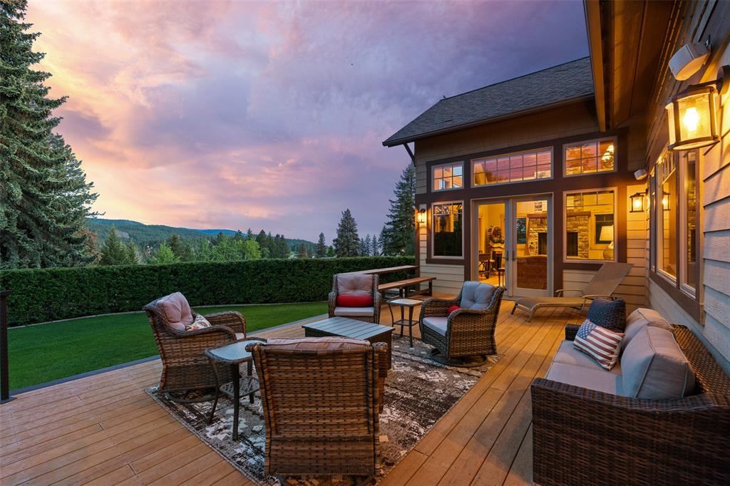 Outdoor deck with pergola and lounge furniture